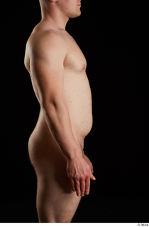 Torin  1 arm flexing nude side view 0001.jpg